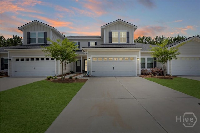 73 Small Pine Ln, Richmond Hill, GA 31324 - traditional home with board and batten siding, a yard, and concrete driveway