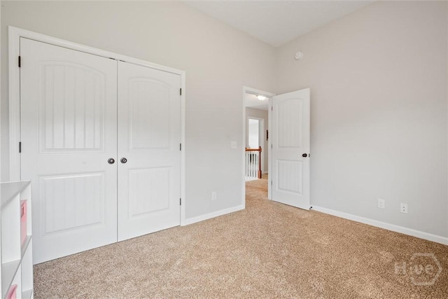 821 NE Mustang Ln, Ludowici, GA 31316 - unfurnished bedroom featuring carpet flooring, a closet, and baseboards