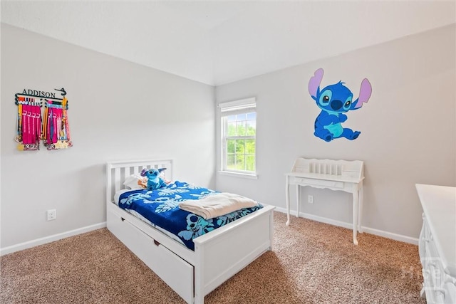 821 NE Mustang Ln, Ludowici, GA 31316 - carpeted bedroom featuring baseboards