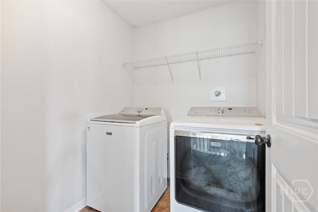 821 NE Mustang Ln, Ludowici, GA 31316 - laundry area featuring independent washer and dryer