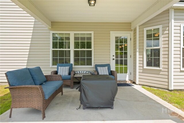 821 NE Mustang Ln, Ludowici, GA 31316 - view of patio / terrace featuring outdoor lounge area