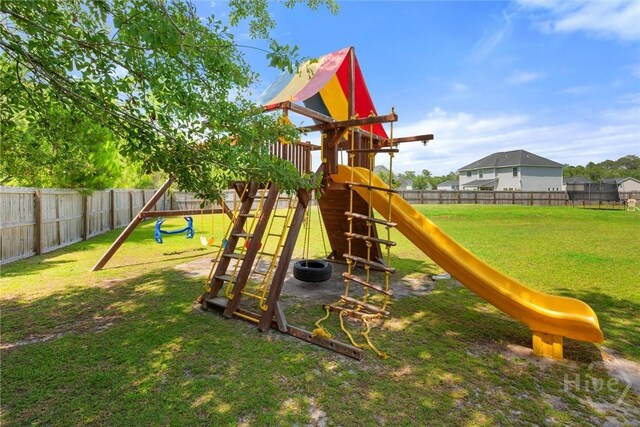 821 NE Mustang Ln, Ludowici, GA 31316 - view of play area with a fenced backyard