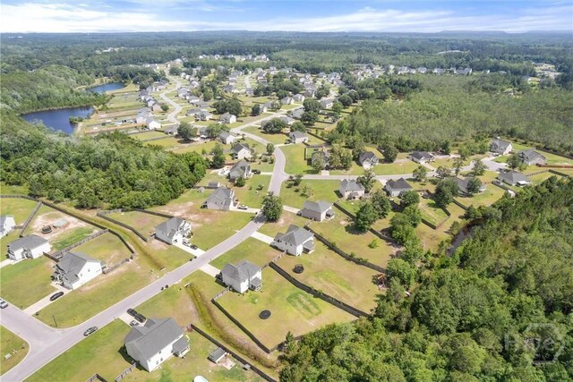 821 NE Mustang Ln, Ludowici, GA 31316 - aerial view of property's location featuring nearby suburban area