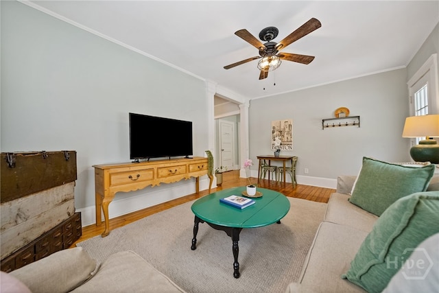 2609 Bismark Ave, Savannah, GA 31406 - living area with a ceiling fan, wood finished floors, ornamental molding, and baseboards