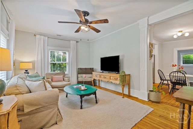 2609 Bismark Ave, Savannah, GA 31406 - living area featuring ceiling fan, crown molding, wood-type flooring, and baseboards