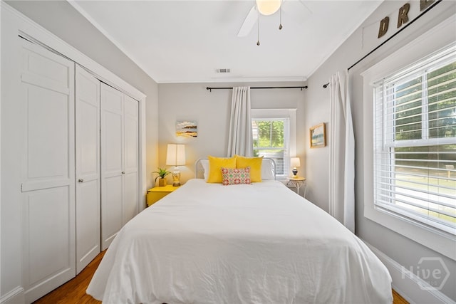 2609 Bismark Ave, Savannah, GA 31406 - bedroom with a closet, dark wood-style flooring, and ceiling fan
