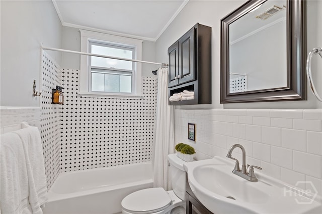 2609 Bismark Ave, Savannah, GA 31406 - bathroom featuring tile walls, shower / tub combo, ornamental molding, vanity, and toilet