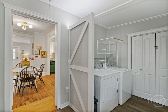 2609 Bismark Ave, Savannah, GA 31406 - laundry room featuring washer and clothes dryer, dark wood-style floors, and ornamental molding