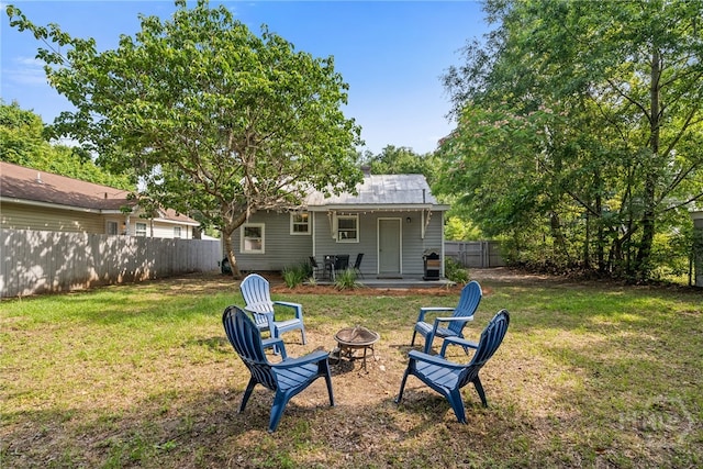 2609 Bismark Ave, Savannah, GA 31406 - rear view of house with a fire pit