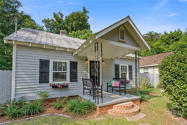2609 Bismark Ave, Savannah, GA 31406 - view of front of house featuring a chimney and metal roof