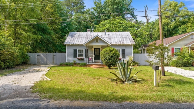 2609 Bismark Ave, Savannah, GA 31406 - bungalow-style house featuring a gate and metal roof