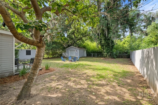 2609 Bismark Ave, Savannah, GA 31406 - view of yard featuring a detached garage