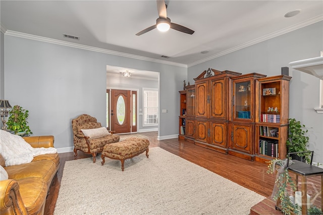 10 Flanders Dr, Richmond Hill, GA 31324 - living area with a ceiling fan, ornamental molding, wood finished floors, and baseboards