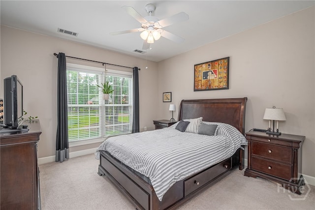 10 Flanders Dr, Richmond Hill, GA 31324 - bedroom with light carpet, baseboards, and a ceiling fan