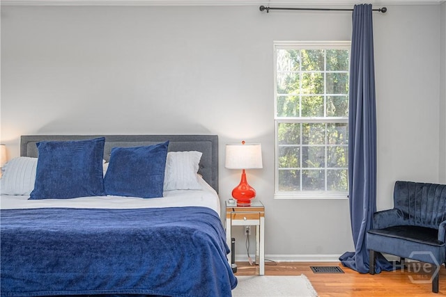 8720 Ferguson Ave, Savannah, GA 31406 - bedroom with wood finished floors and baseboards