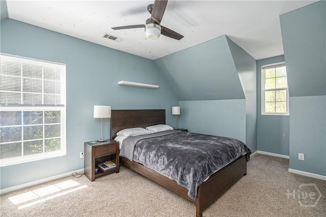 8720 Ferguson Ave, Savannah, GA 31406 - carpeted bedroom with vaulted ceiling, baseboards, and a ceiling fan