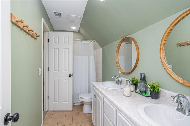 8720 Ferguson Ave, Savannah, GA 31406 - full bath featuring vaulted ceiling, tile patterned floors, double vanity, toilet, and a shower with curtain