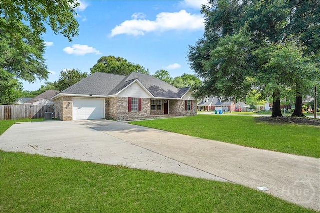 125 Crossing Cir, Rincon, GA 31326 - ranch-style home with concrete driveway, an attached garage, and central AC