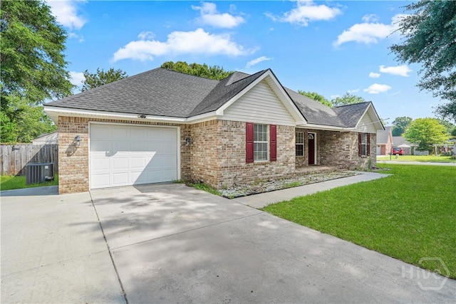 125 Crossing Cir, Rincon, GA 31326 - ranch-style home with concrete driveway, a garage, cooling unit, and brick siding