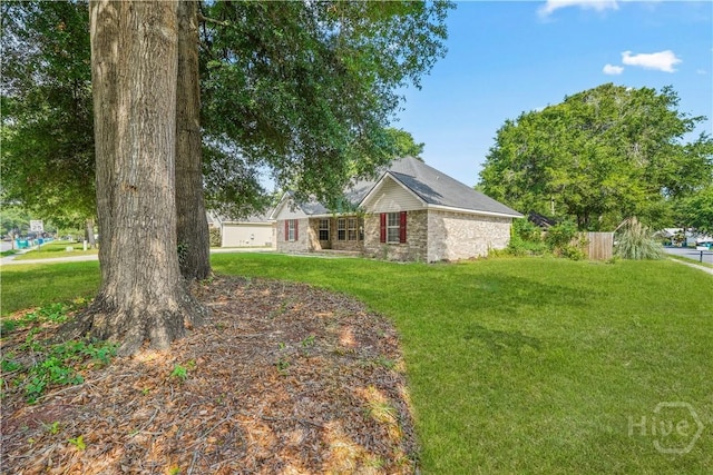 125 Crossing Cir, Rincon, GA 31326 - view of front of property with a front lawn