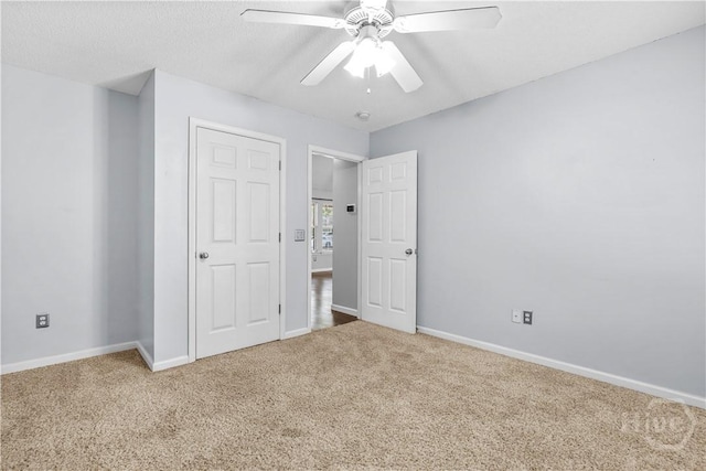 125 Crossing Cir, Rincon, GA 31326 - unfurnished bedroom featuring carpet floors, baseboards, and a ceiling fan