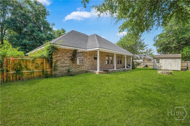 125 Crossing Cir, Rincon, GA 31326 - back of property with a shingled roof and brick siding