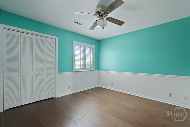 104 Bull River Bluff Dr Unit 104, Savannah, GA 31410 - unfurnished bedroom featuring wood finished floors, a closet, ceiling fan, and baseboards