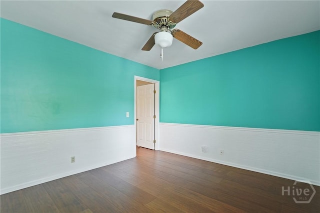 104 Bull River Bluff Dr Unit 104, Savannah, GA 31410 - unfurnished room with baseboards, dark wood-style floors, and a ceiling fan