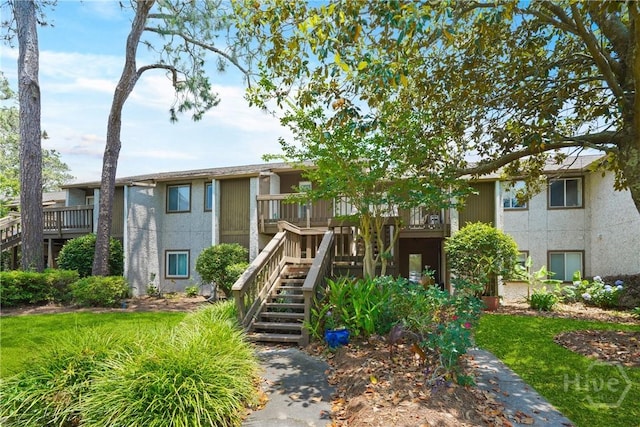 104 Bull River Bluff Dr Unit 104, Savannah, GA 31410 - view of building exterior with stairway