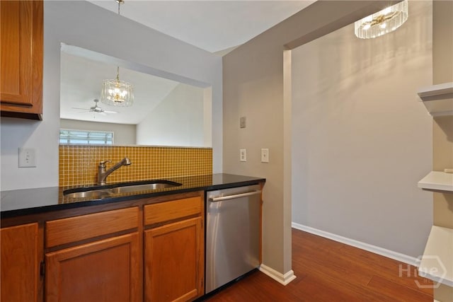 104 Bull River Bluff Dr Unit 104, Savannah, GA 31410 - kitchen with stainless steel dishwasher, a sink, dark wood-style flooring, decorative backsplash, and brown cabinetry