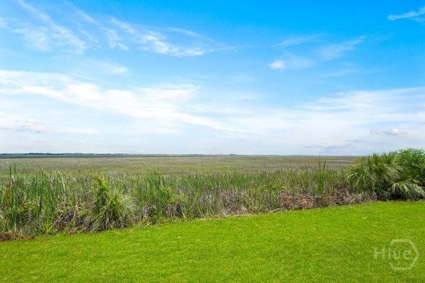 104 Bull River Bluff Dr Unit 104, Savannah, GA 31410 - view of grassy yard with a view of rural / pastoral area