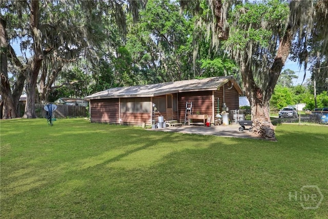 24 Mimosa St, Midway, GA 31320 - rear view of property featuring a patio area