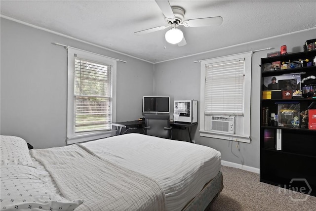 24 Mimosa St, Midway, GA 31320 - bedroom featuring carpet flooring, cooling unit, baseboards, and ceiling fan