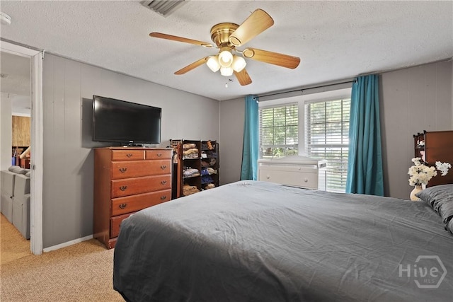 24 Mimosa St, Midway, GA 31320 - carpeted bedroom with a ceiling fan and a textured ceiling