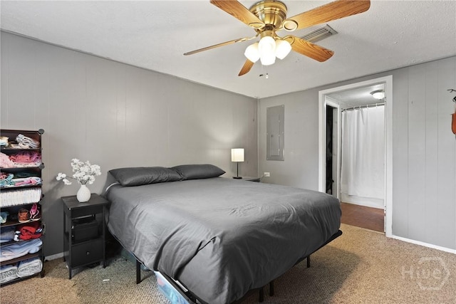 24 Mimosa St, Midway, GA 31320 - bedroom with electric panel, carpet, a ceiling fan, and baseboards