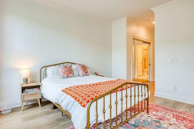 329 W Charlton St, Savannah, GA 31401 - bedroom with crown molding, wood finished floors, and baseboards