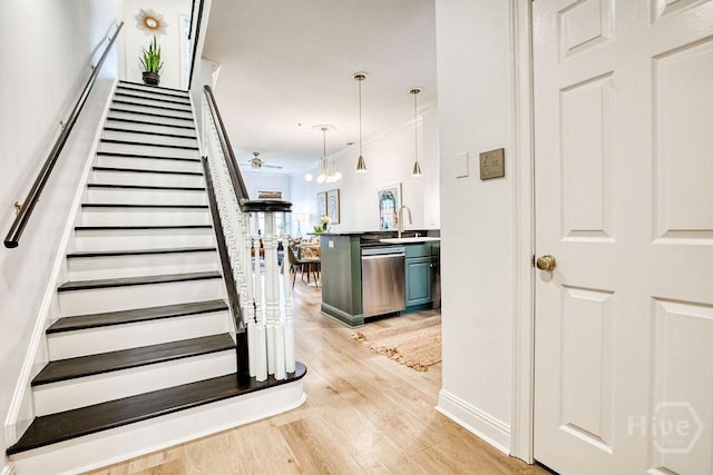 329 W Charlton St, Savannah, GA 31401 - stairs with wood finished floors and crown molding