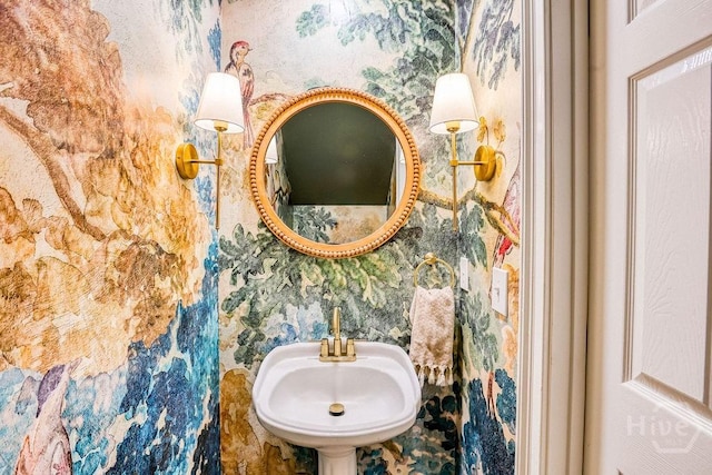 329 W Charlton St, Savannah, GA 31401 - bathroom featuring wallpapered walls and a sink