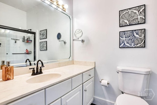 329 W Charlton St, Savannah, GA 31401 - bathroom featuring vanity, toilet, and a tile shower