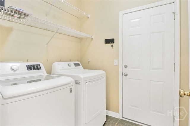 817 Granite Ln, Savannah, GA 31419 - laundry room with washer and clothes dryer, baseboards, and tile patterned floors