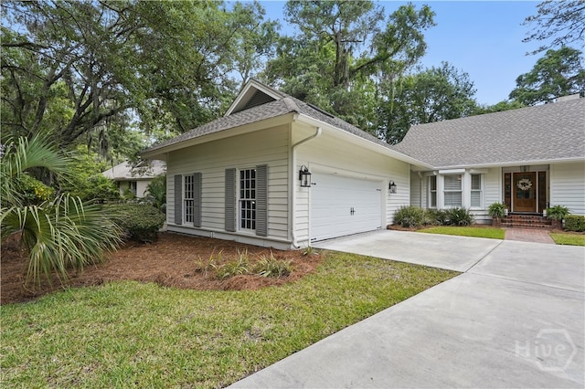 3 Benedictine Retreat Retreat, Savannah, GA 31411 - ranch-style house featuring a garage, driveway, roof with shingles, and a front yard