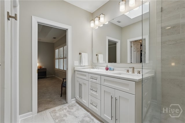 3 Benedictine Retreat Retreat, Savannah, GA 31411 - bathroom featuring double vanity, baseboards, and a shower
