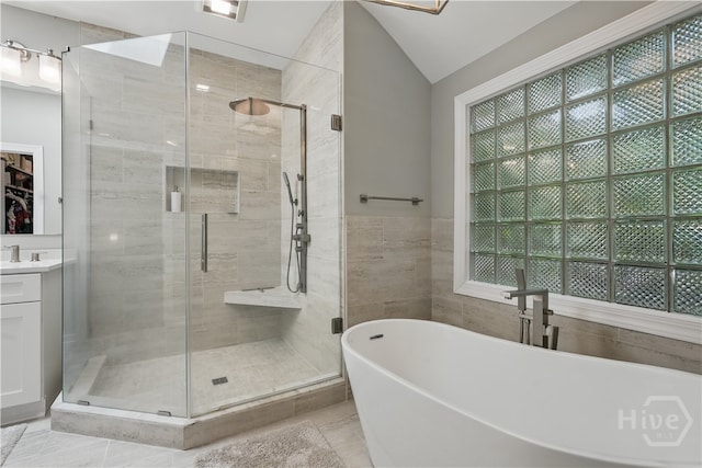 3 Benedictine Retreat Retreat, Savannah, GA 31411 - bathroom with a soaking tub, a stall shower, vanity, and vaulted ceiling