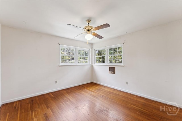 1525 Whitney Rd, Savannah, GA 31406 - spare room featuring baseboards, a ceiling fan, and hardwood / wood-style flooring