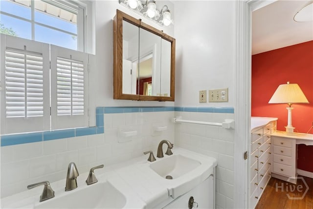 1525 Whitney Rd, Savannah, GA 31406 - bathroom featuring double vanity and wood finished floors