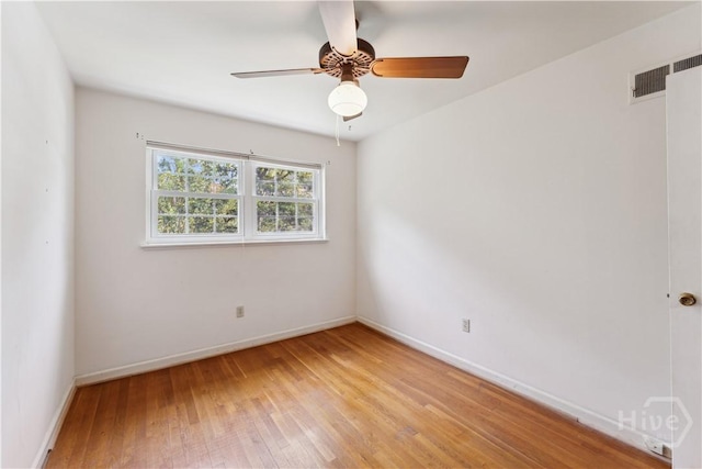 1525 Whitney Rd, Savannah, GA 31406 - spare room with light wood-type flooring, baseboards, and ceiling fan