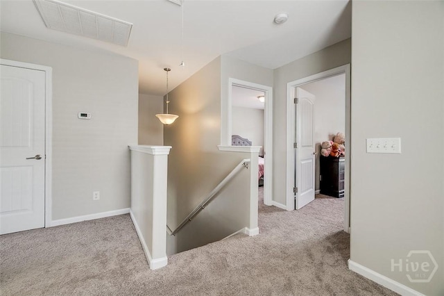 141 Lakepointe Dr, Savannah, GA 31407 - corridor featuring an upstairs landing, carpet, and baseboards
