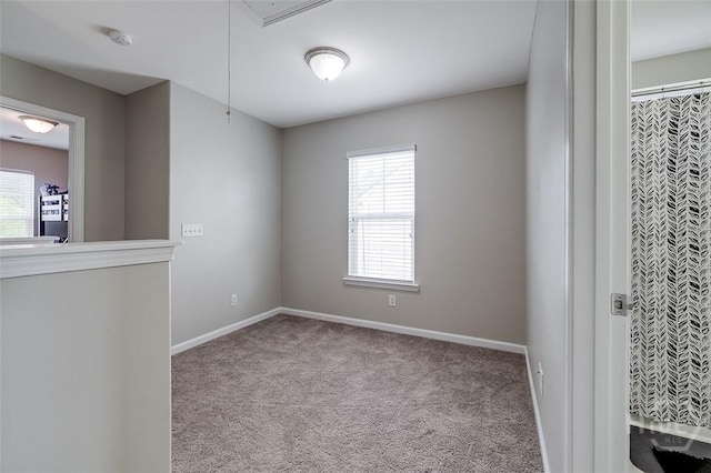 141 Lakepointe Dr, Savannah, GA 31407 - empty room featuring healthy amount of natural light, carpet, and baseboards