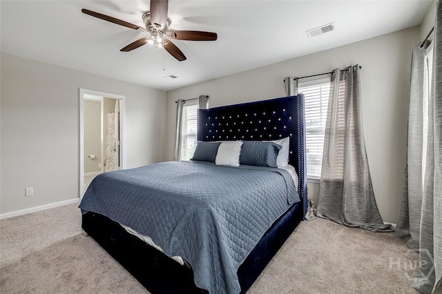 141 Lakepointe Dr, Savannah, GA 31407 - bedroom with carpet floors, baseboards, a ceiling fan, and ensuite bath