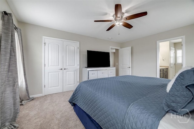 141 Lakepointe Dr, Savannah, GA 31407 - bedroom with carpet, a closet, a ceiling fan, baseboards, and ensuite bath
